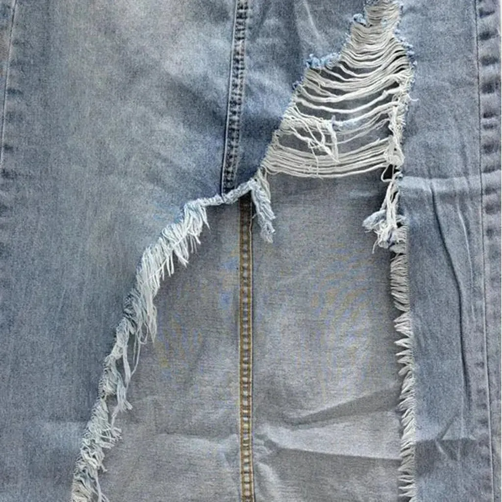 Distressed long denim skirt