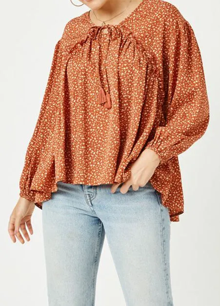 Ruffled Seam Tasseled Long Sleeve Top